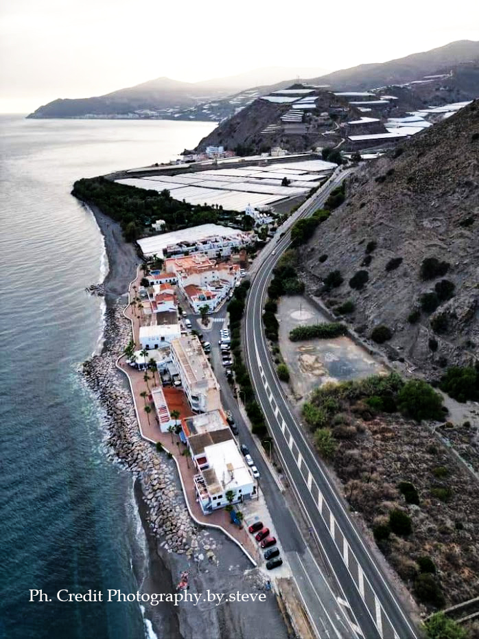 Aerial photo of Costa Tropical with a view on the mountains and greenhouses. Andalusia.